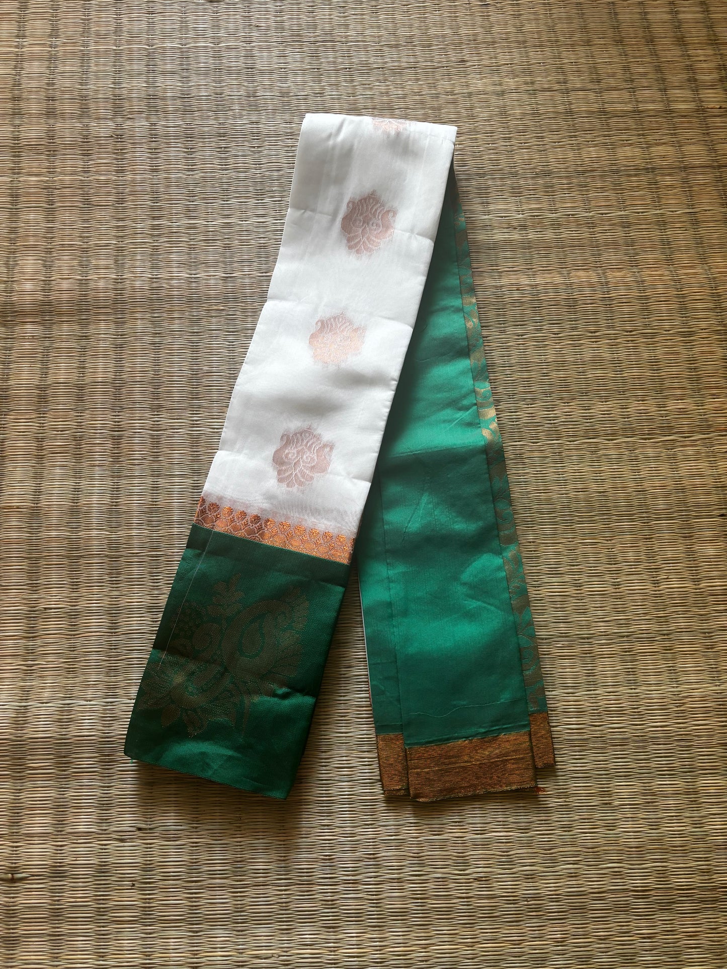 White cotton saree with green border and antique gold motifs