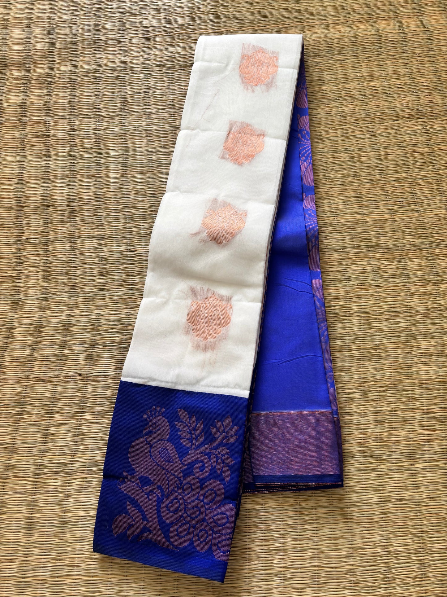 White cotton saree with blue border and antique gold motifs